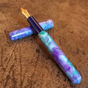 Stanford Wood Studio silk fountain pen uncapped turquoise and purple
