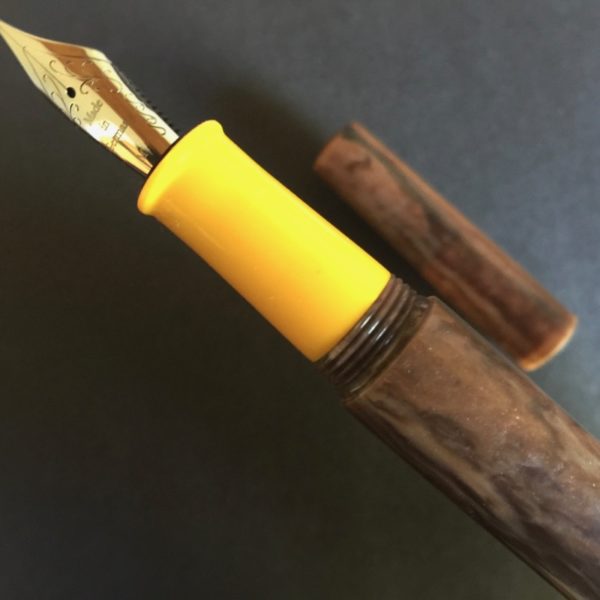 Fountain pen with mix of coffee colours and bright yellow section 3