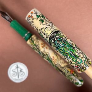 Close-up of pen cap showing the wizard with his sparkly eyes, scrunched up old hat and green beard that resembles roots or tendrils